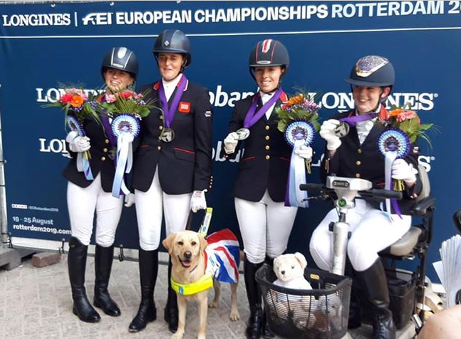 Mari Akhurst and Team GBR show off their medals